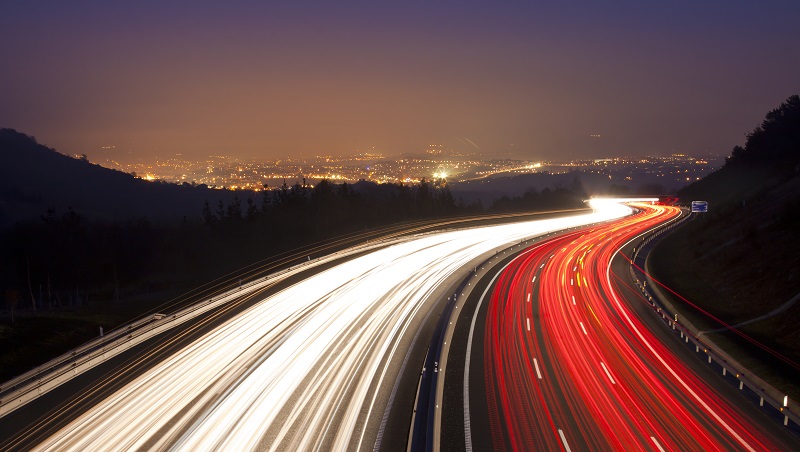 Fast moving transport passes along a highway