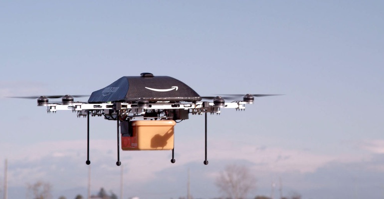 Amazon Prime Air cargo drone with a parcel box attached to it flying to its destination.