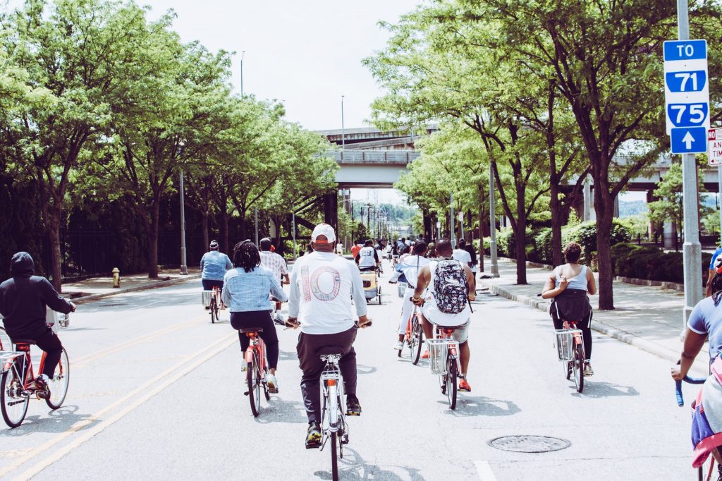 Active urban bicycle traffic on a road for bicycle and motorcycle transportation.  