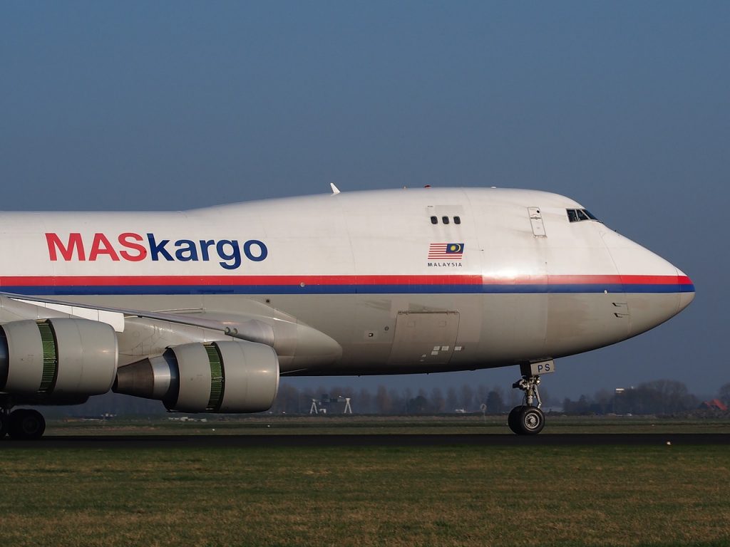 A jumbo jet Boeing 747 ready for takeoff on a clear day. 