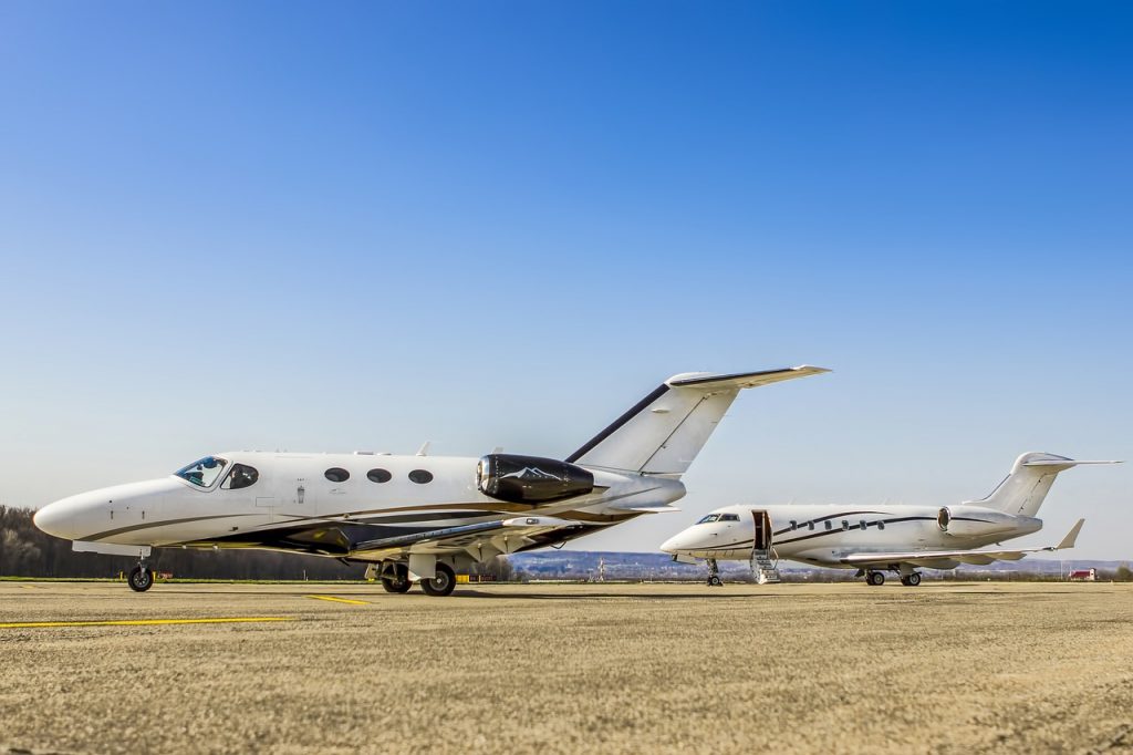 Two small private jets requiring to be piloted by a private pilot stationed in an airfield.