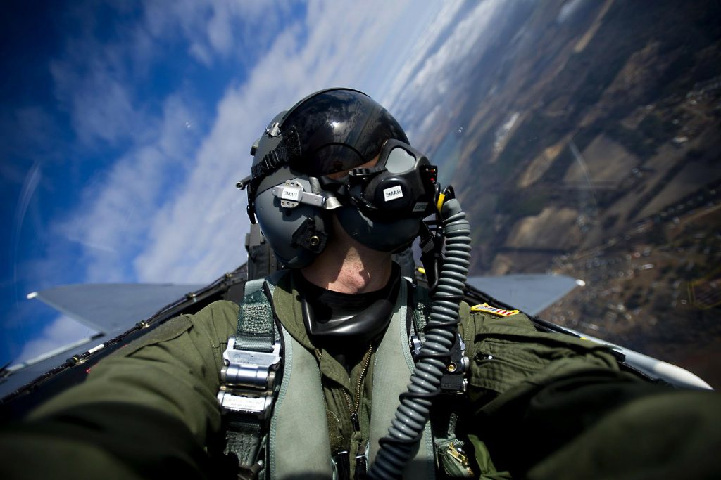 An US Airforce military pilot in training, flying through military operations areas.