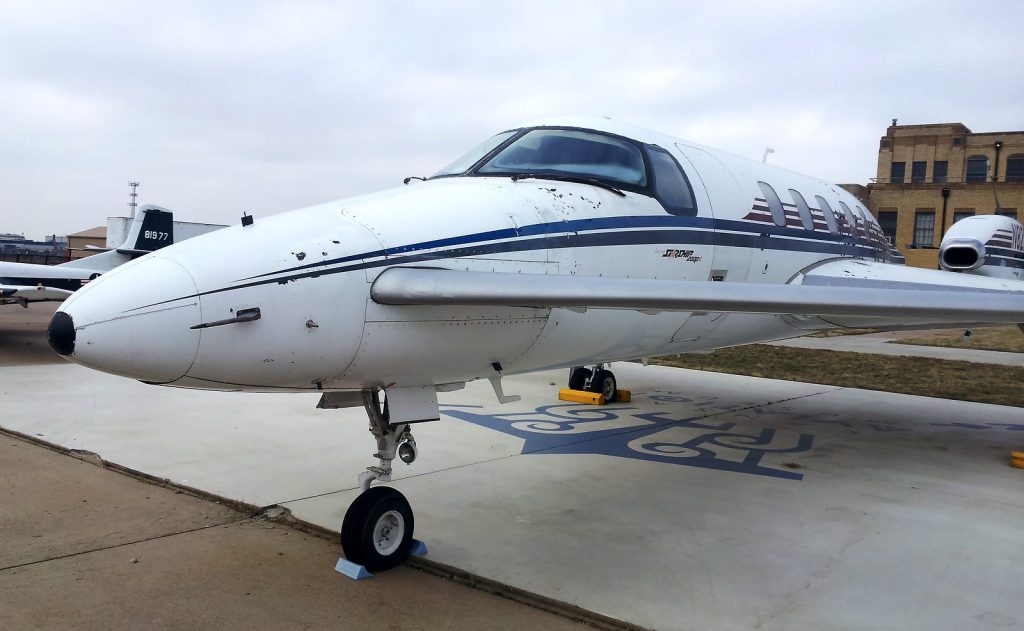 A decommissioned Beechcraft Starship stationed in a museum airfield.