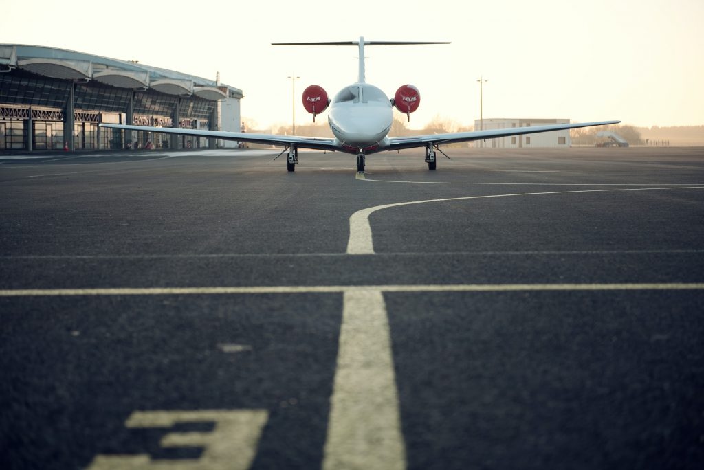 A private airplane fuelled for flights and taxiing to a runway.