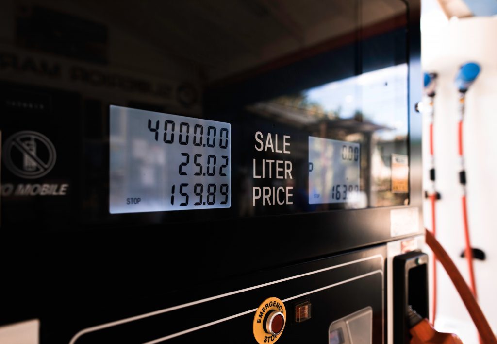 A display of fuel prices at a gas station.