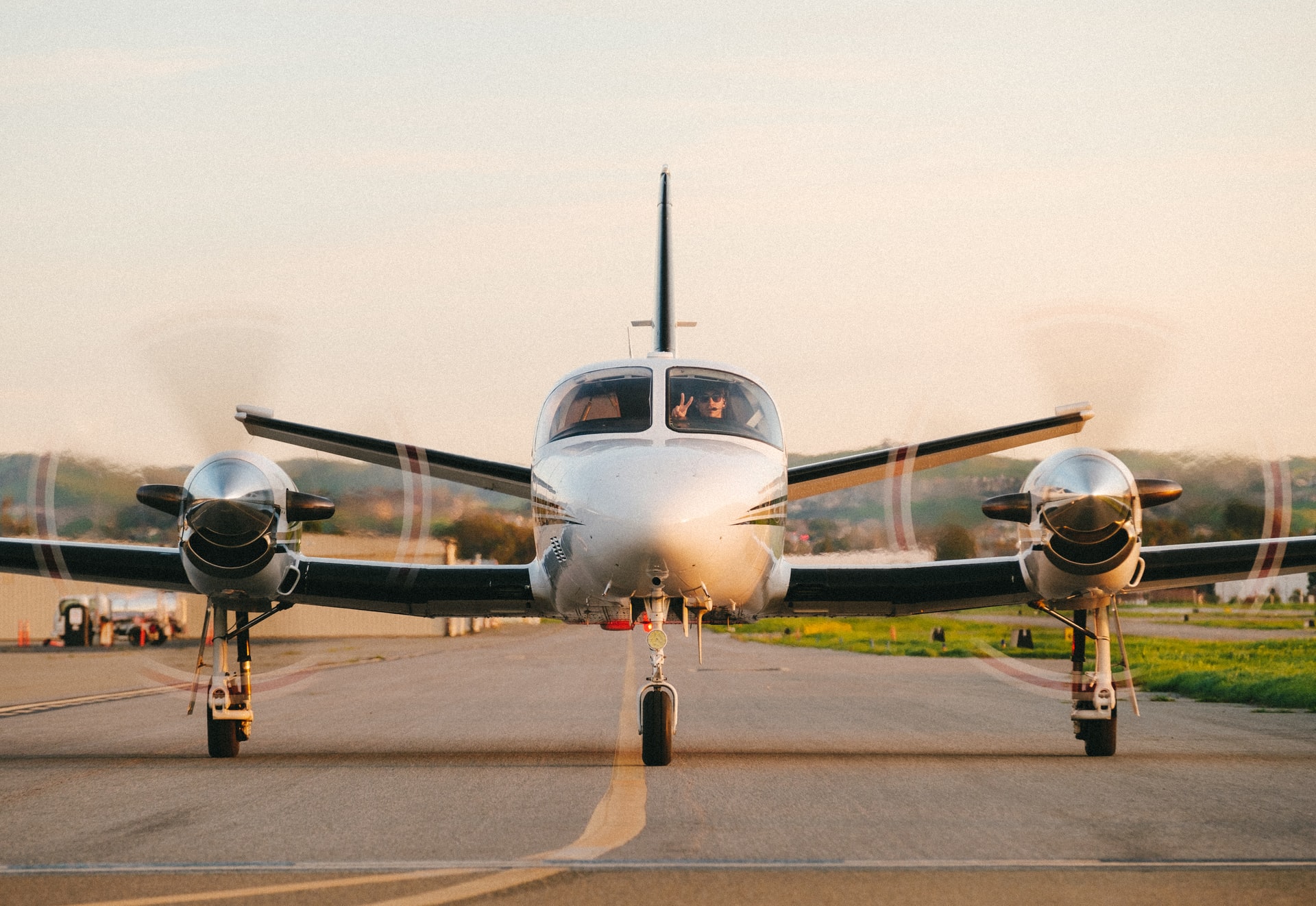 Cessna Conquest twin engine turboprop with its pilot ready for take off on the runway.