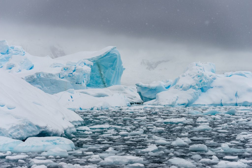 Icy cliffs and icy water in Antarctica.