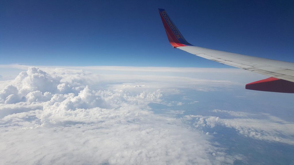 An aircraft flying through a class A airspace during daytime.