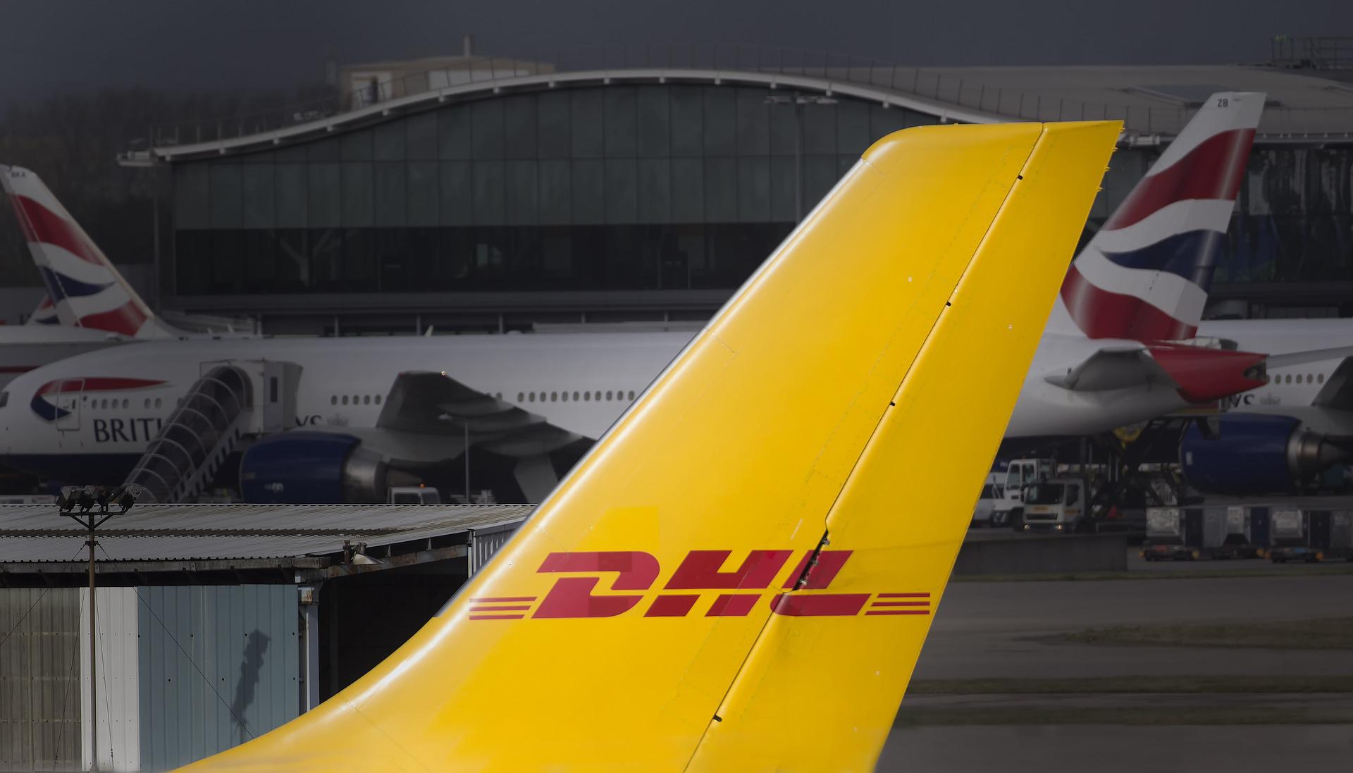 The tail of a DHL cargo airplane.