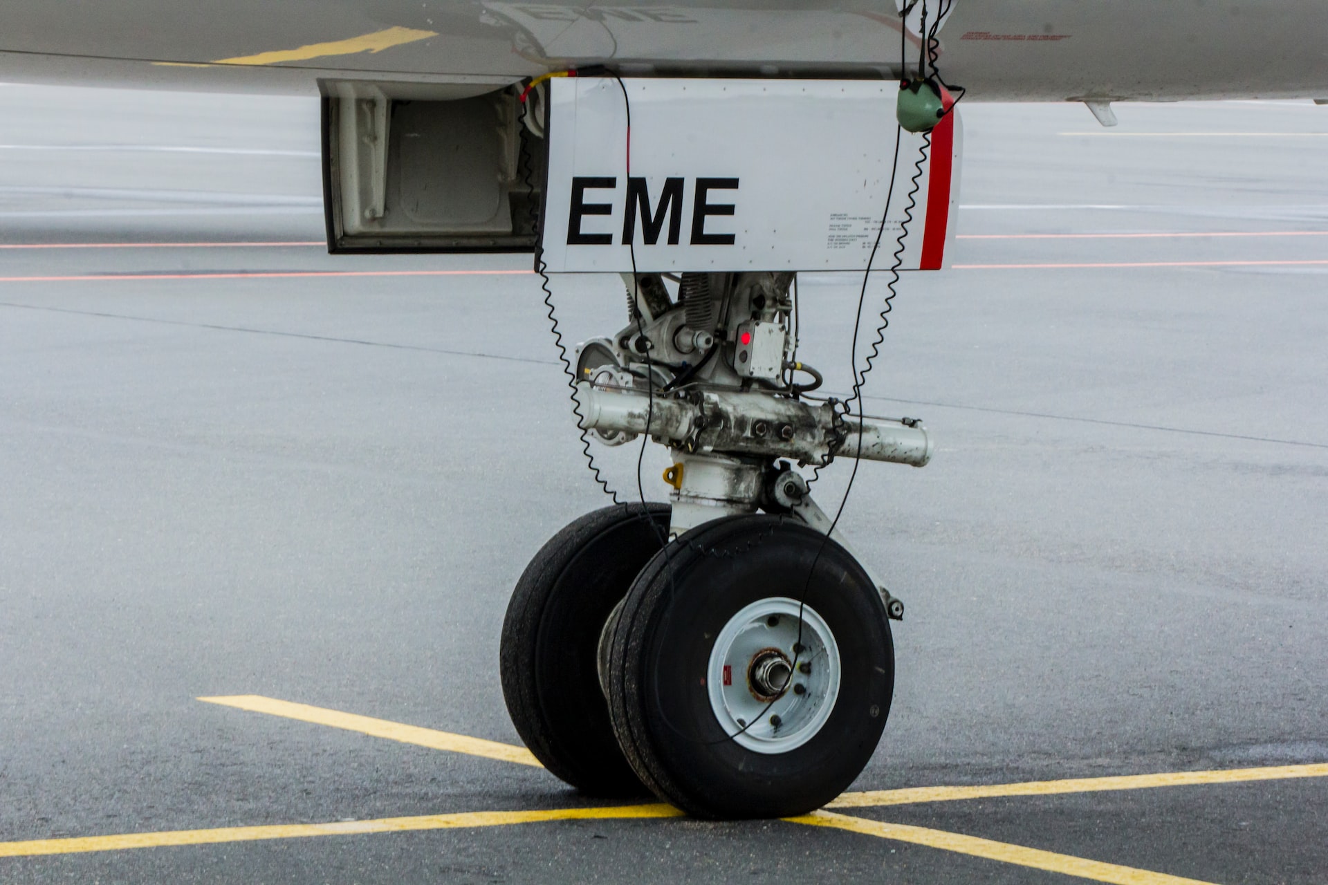 A pair of aircraft wheels on landing gear.