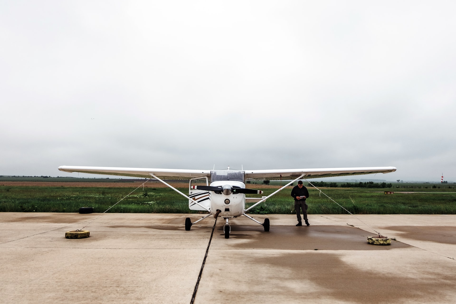 An airplane owner working on his used airplane.