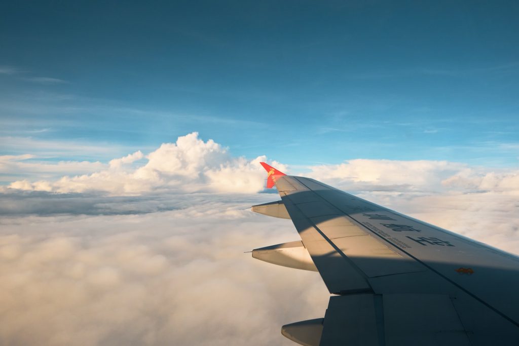 An airplane flying at a high altitude.