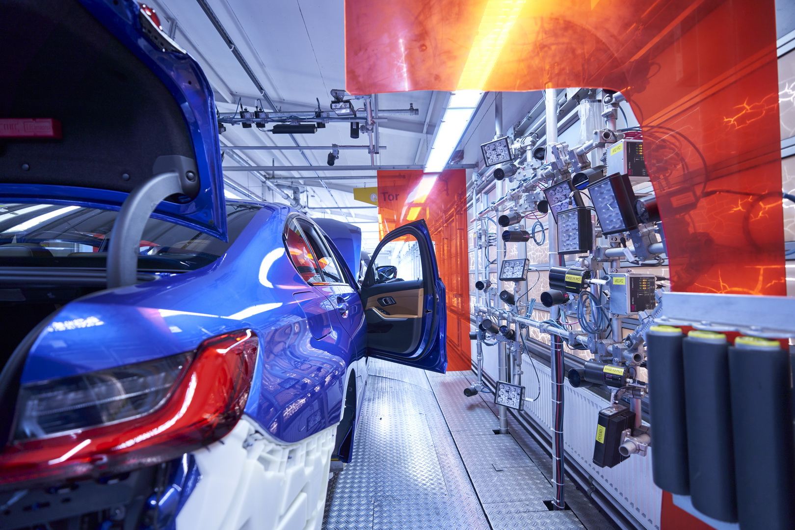 BMW utilizing Edge AI in car manufacturing.
