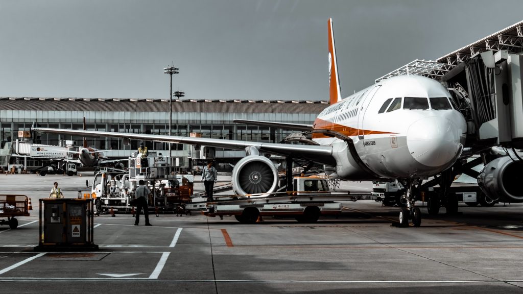 Aircraft being loaded with cargo.